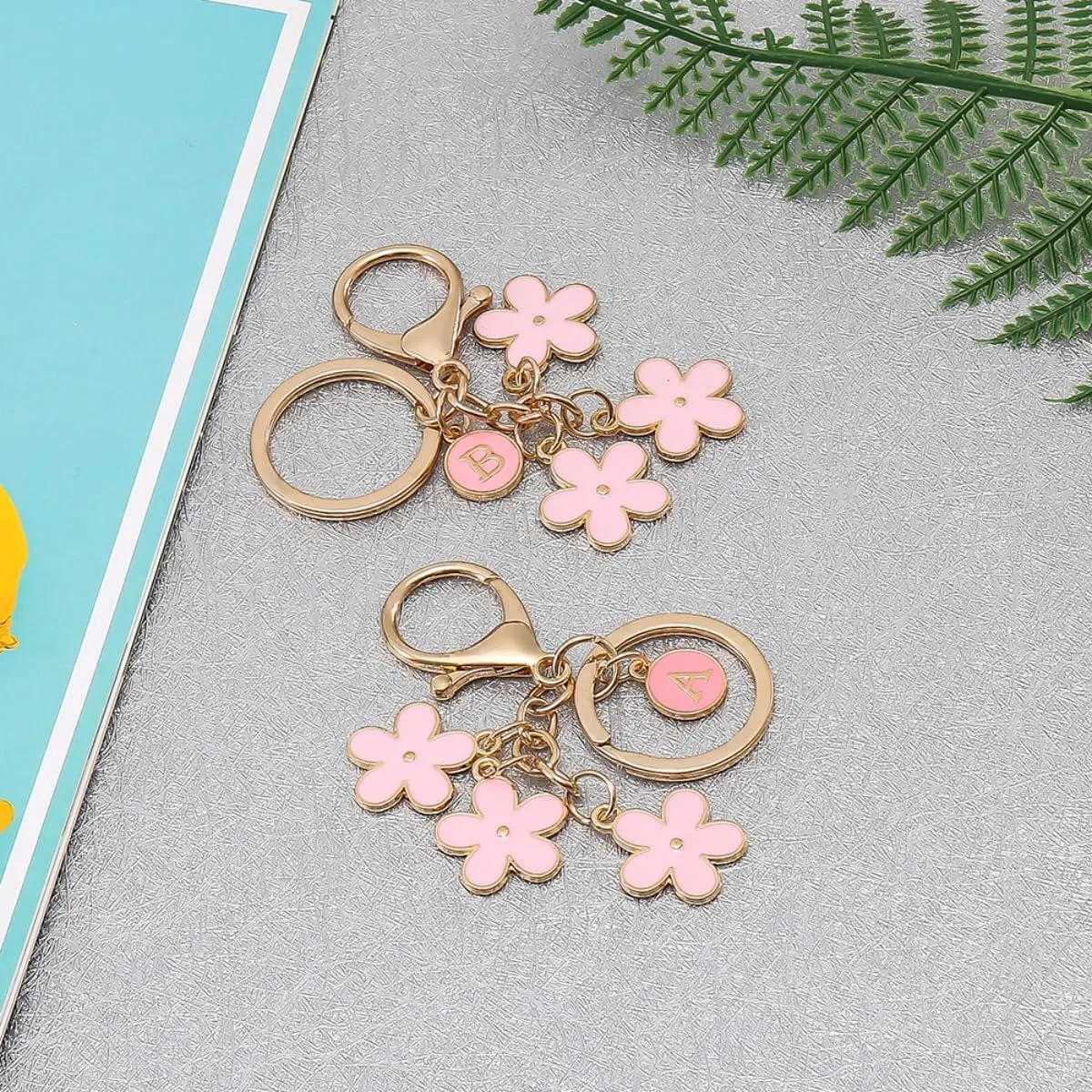 IKANOO Pink Flower Initial Letter Keychain Flower Bag Charms Enameled Keyring For Women Girls Purse Bag Accessories Jewellery